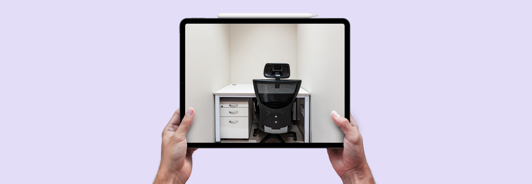 person holding a tablet with a photo of a self storage office