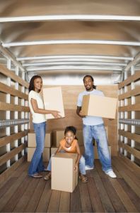 family moving with boxes