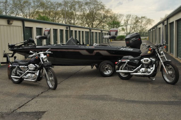 Motorcycles And Boat At Self Storage Facility